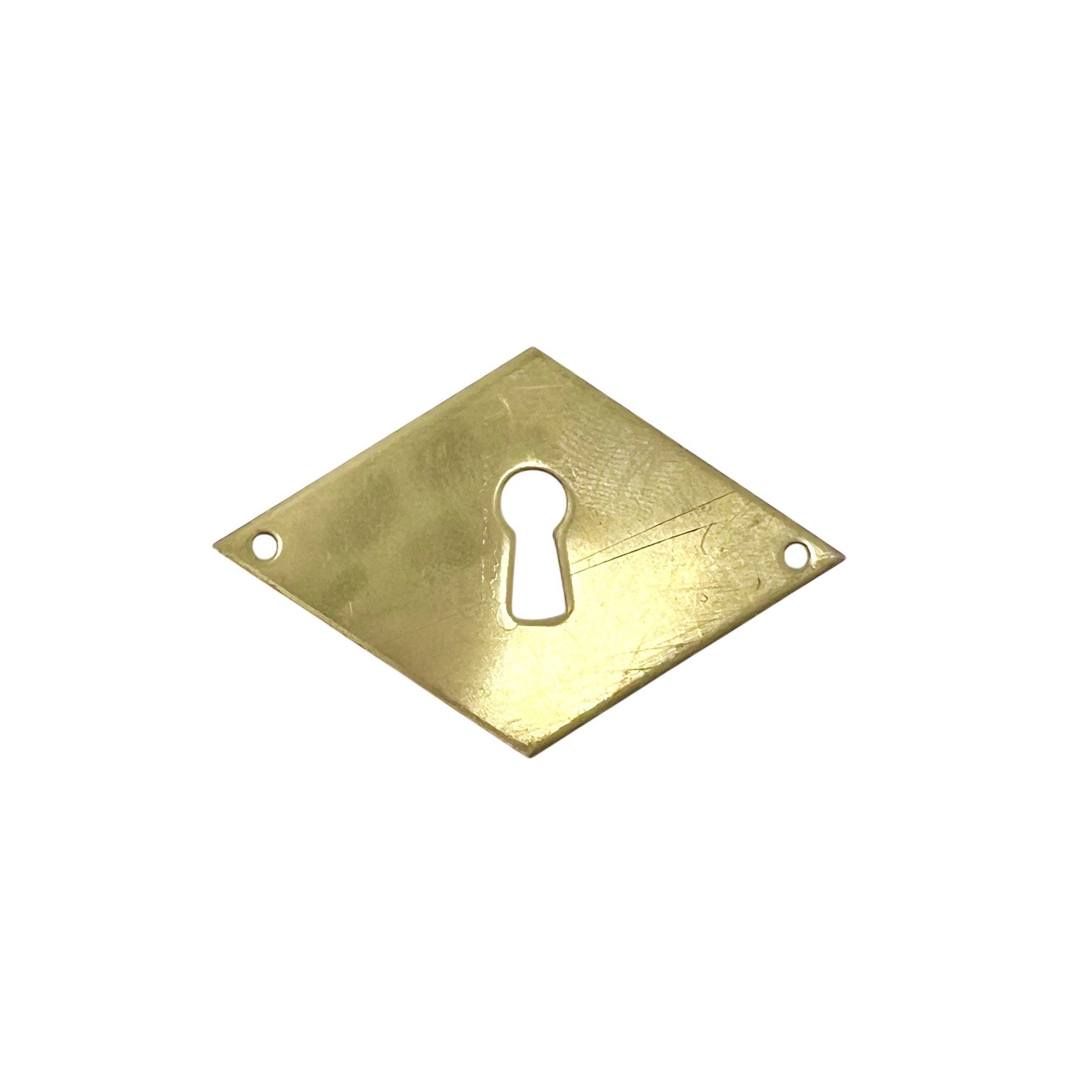 Nyckelskylt 63x40mm Mässing